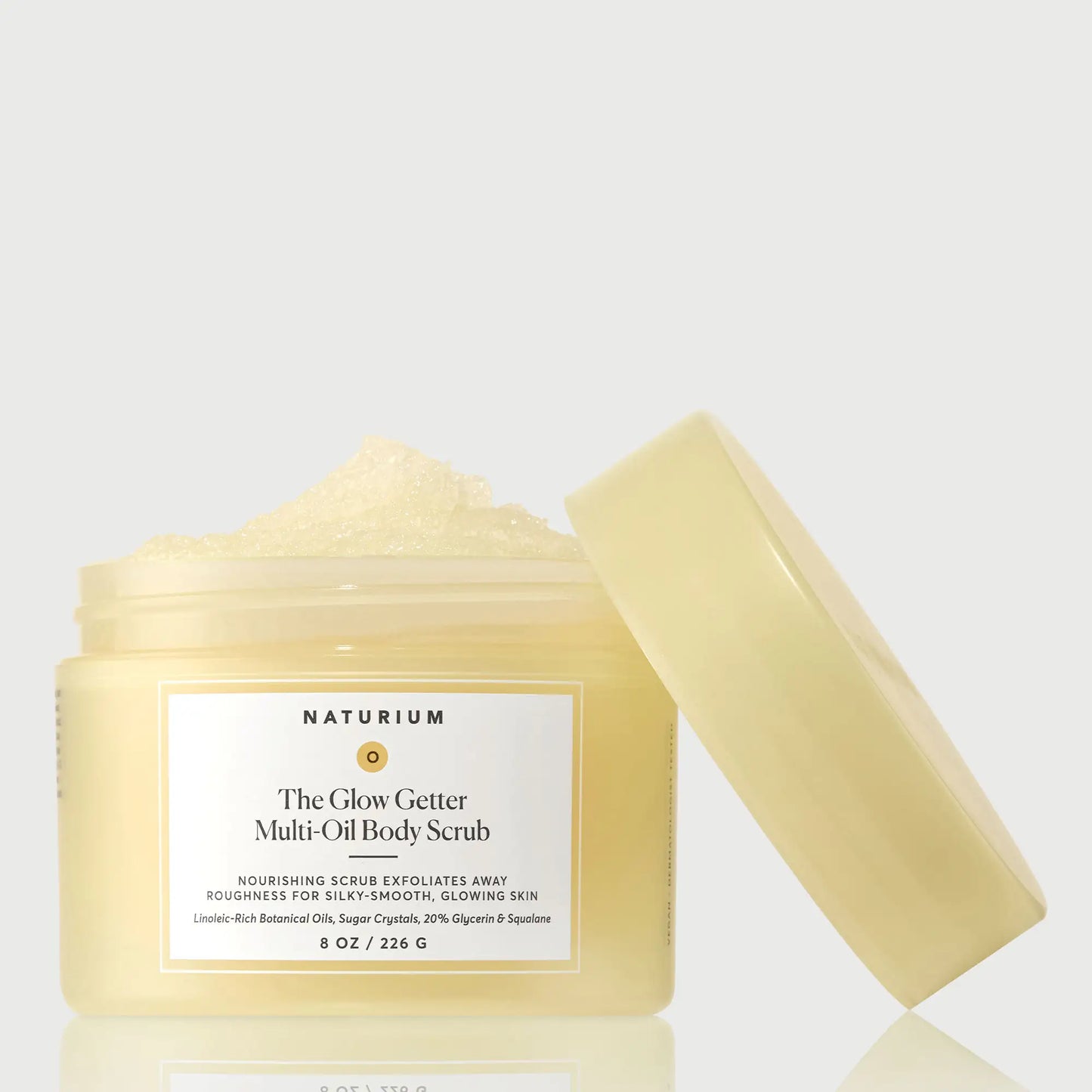 the-glow-getter-multi-oil-body-scrub-b6 NATR-40028-GlowGetter-Multi-Oil-Body-Scrub-Front-CapOff-bonebkgd.webp